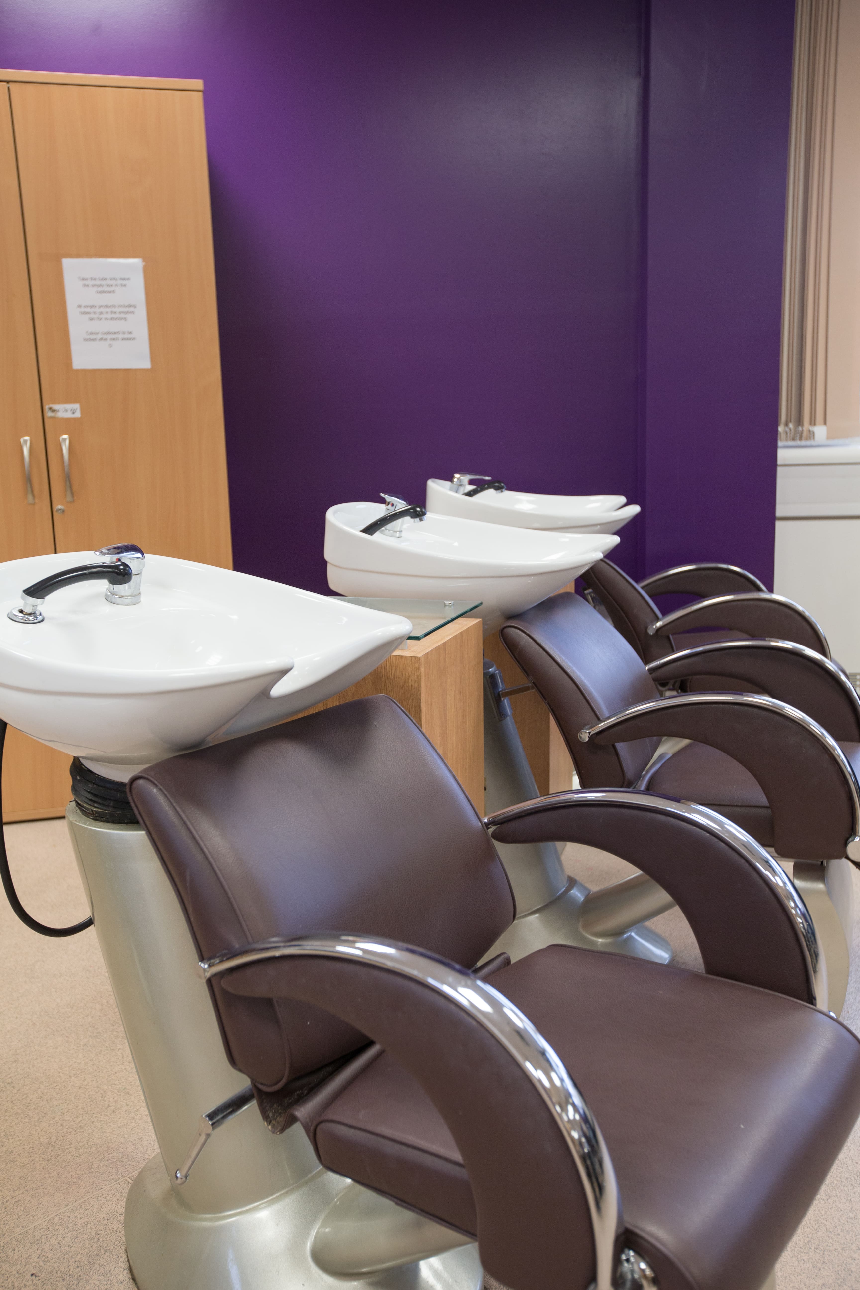 salon chairs head sink close up