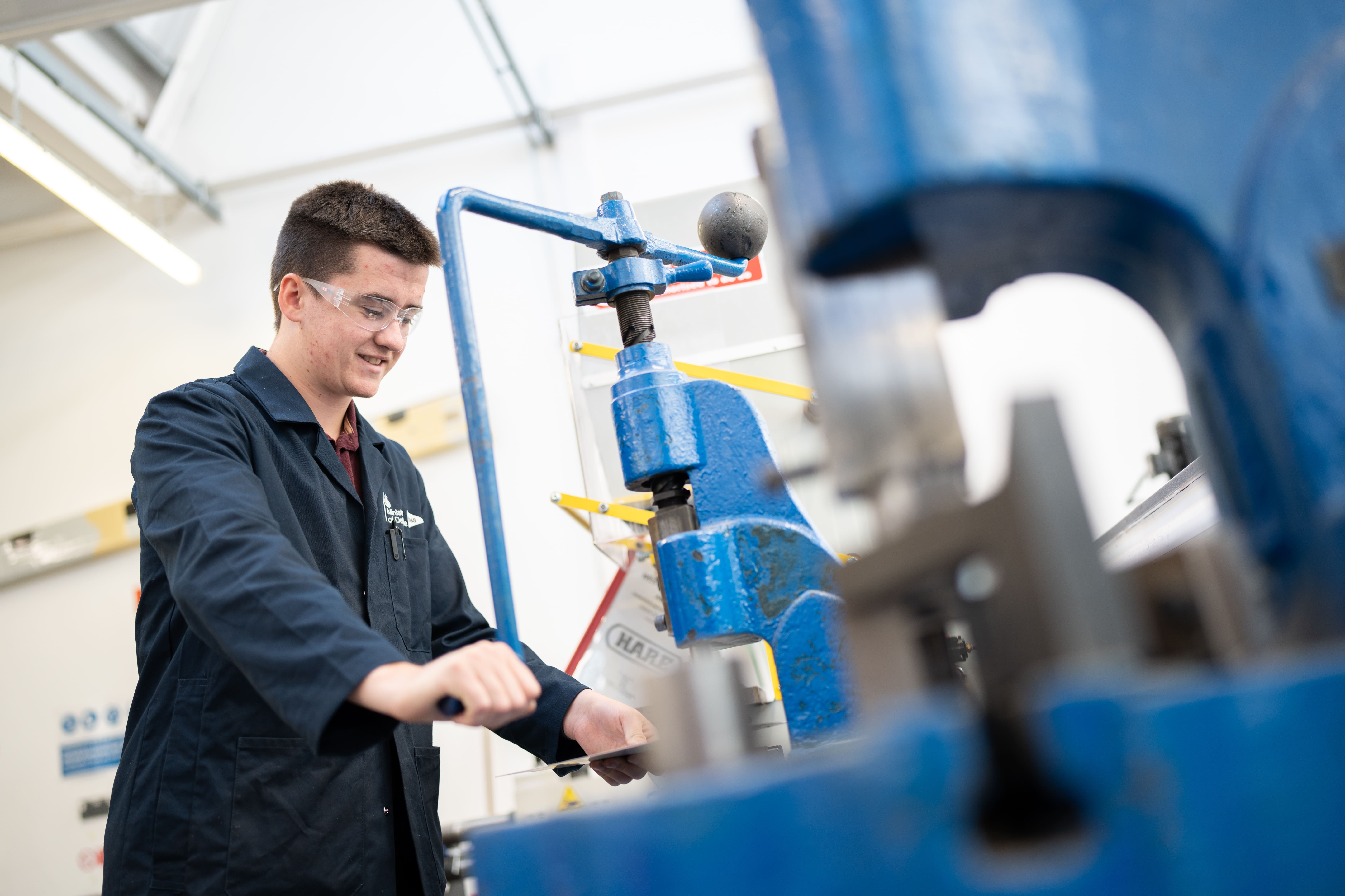 student using drill machine 