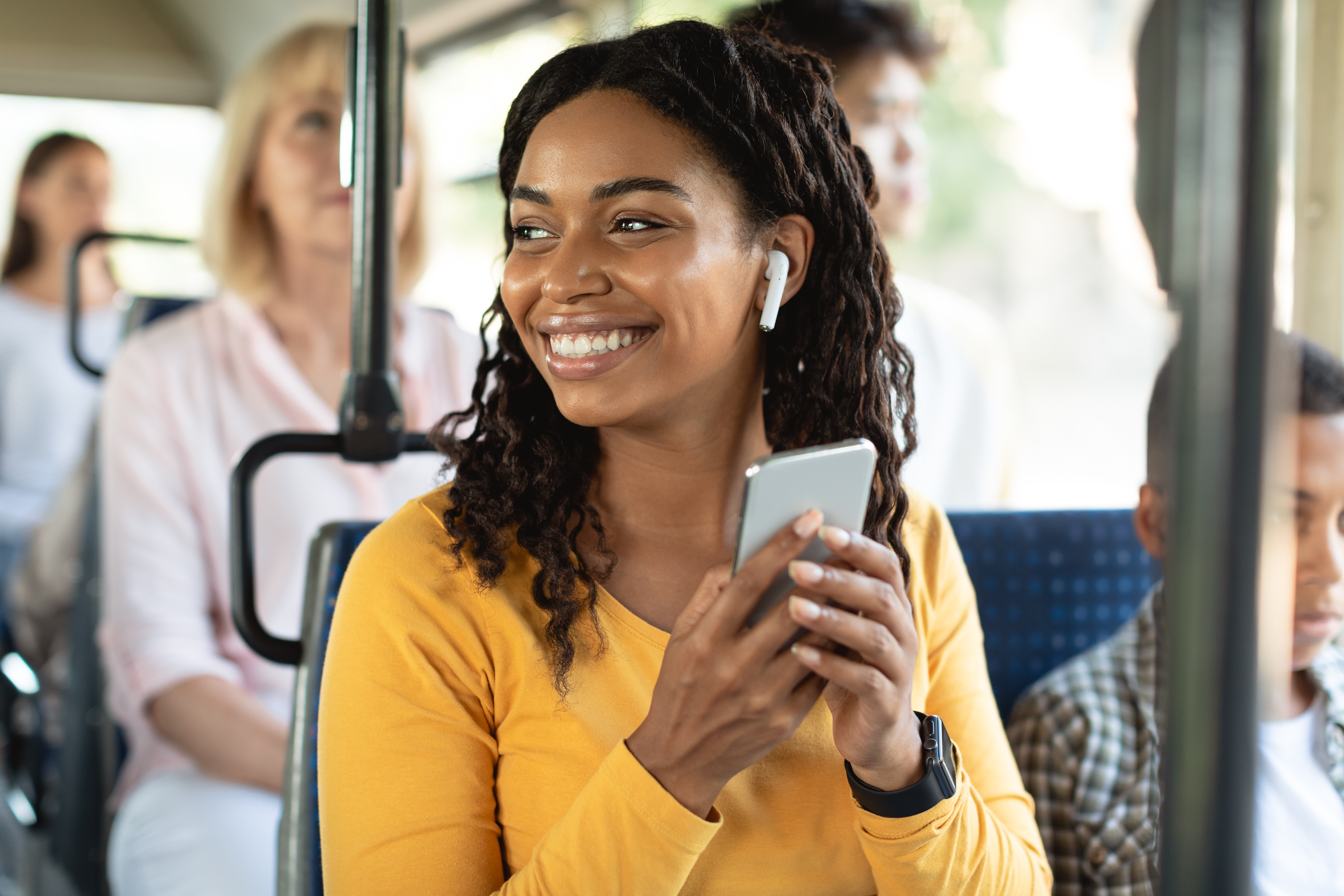 girl smiling on bus
