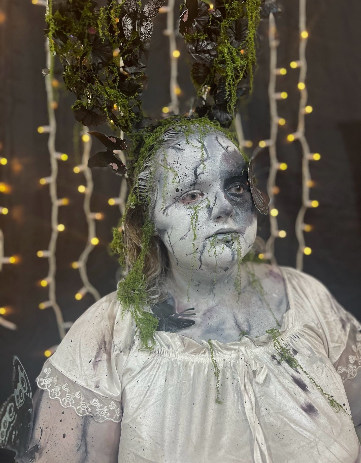 Student with ghostly black and white face paint