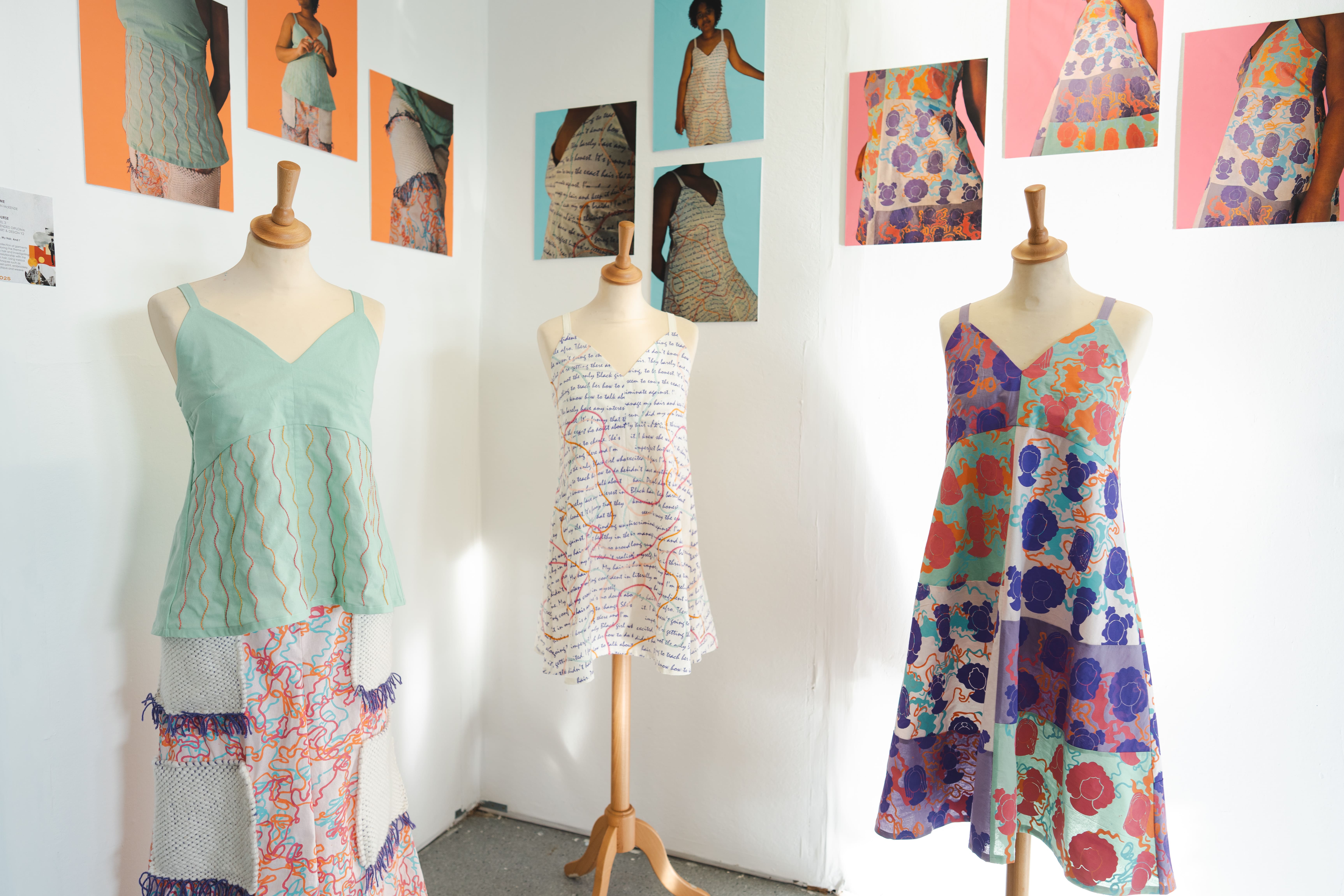 3 dress designs on manikins 