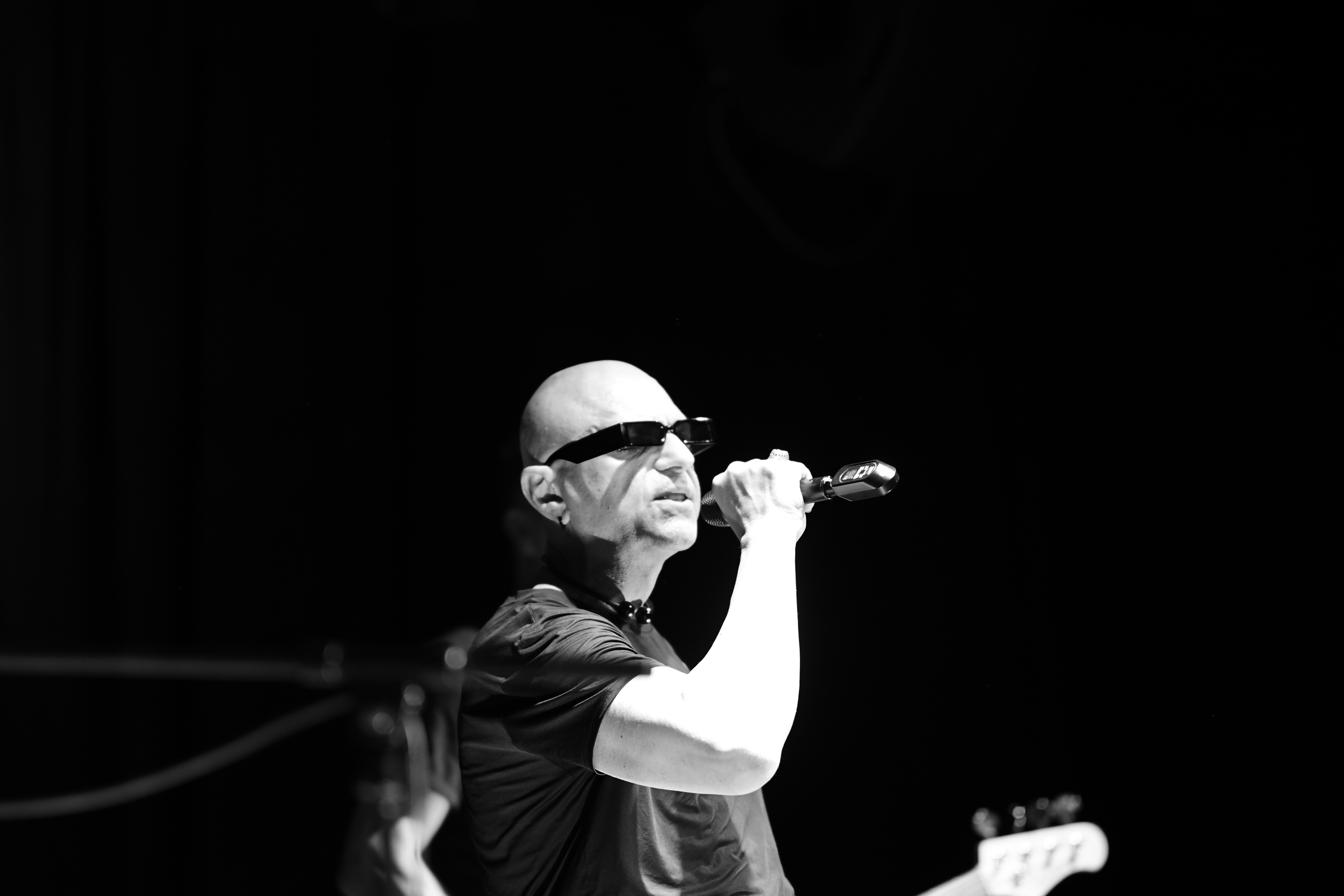 The Peripheries Lead Singer singing on stage