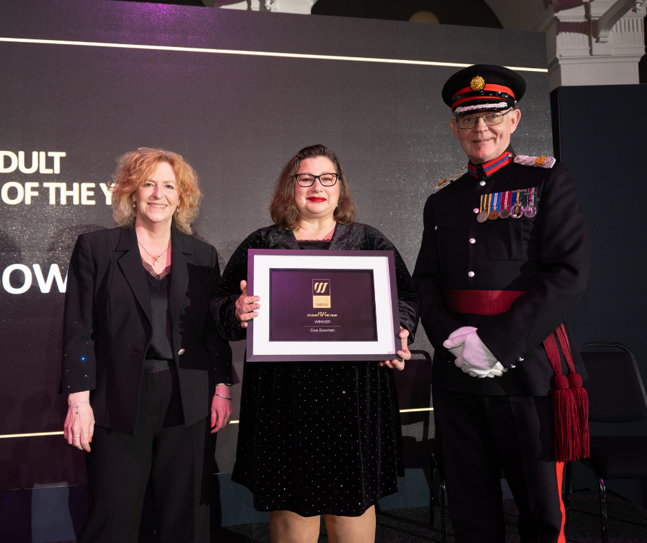 Ewa collecting her award at Celebration of Success 2025