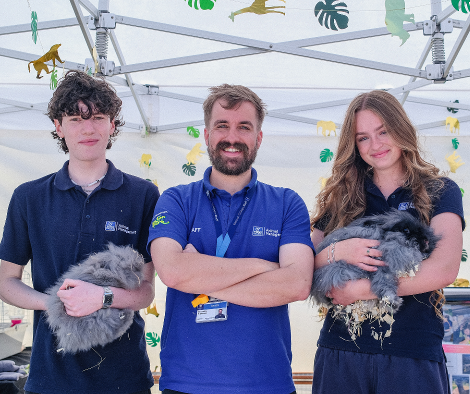 animal management learners with rabbits