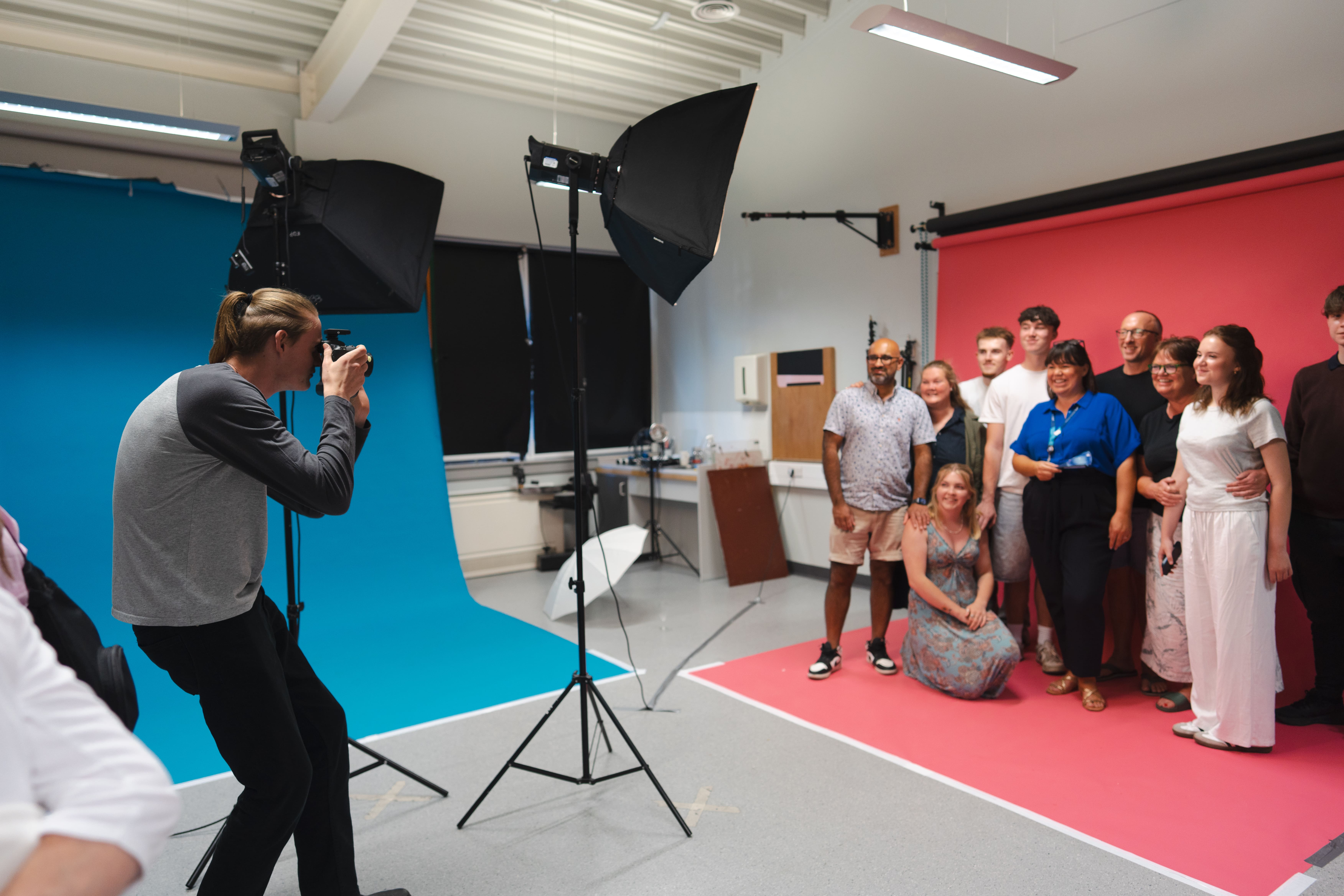 people having their picture taken in a studio