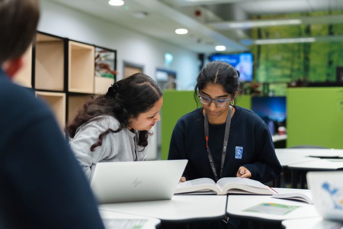 Two learners studying in the Library Plus