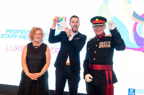 Luke celebrating his award win