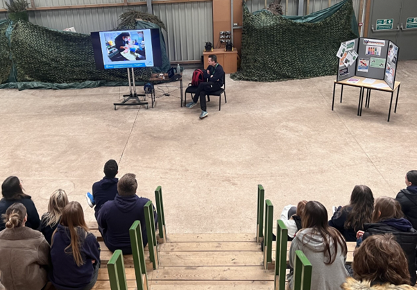 Students listening to talk at Puxton