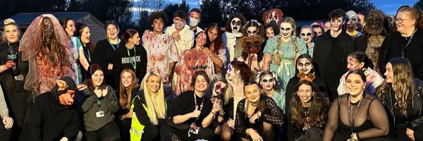 Learners gathered together whilst dressed in spooky outfits