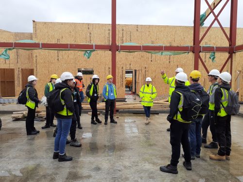 Learners inspecting the building structure