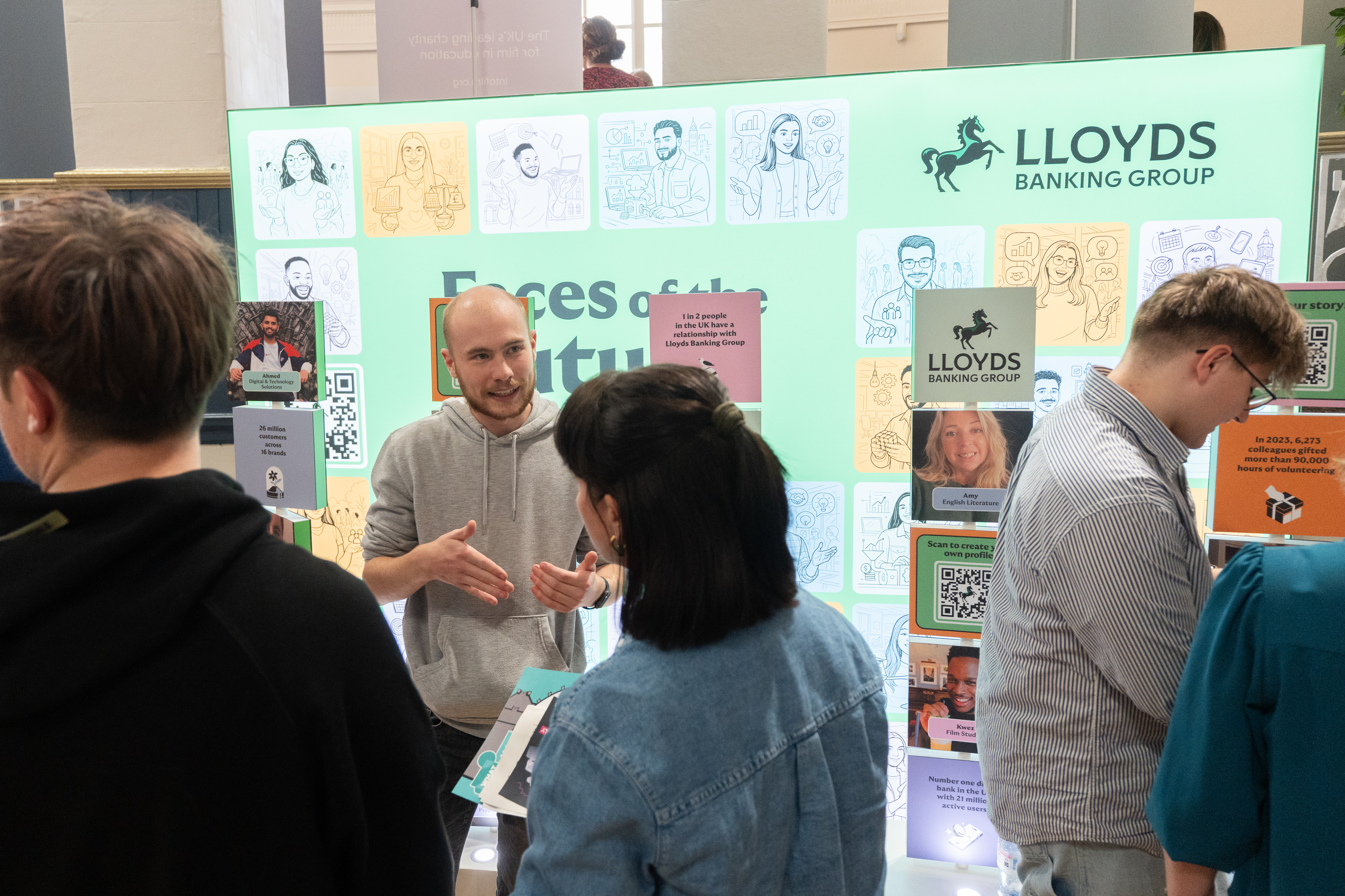 Attendees speaking to apprentices from Lloyds Banking Group