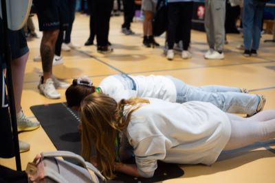Two learners competing in a planking competition