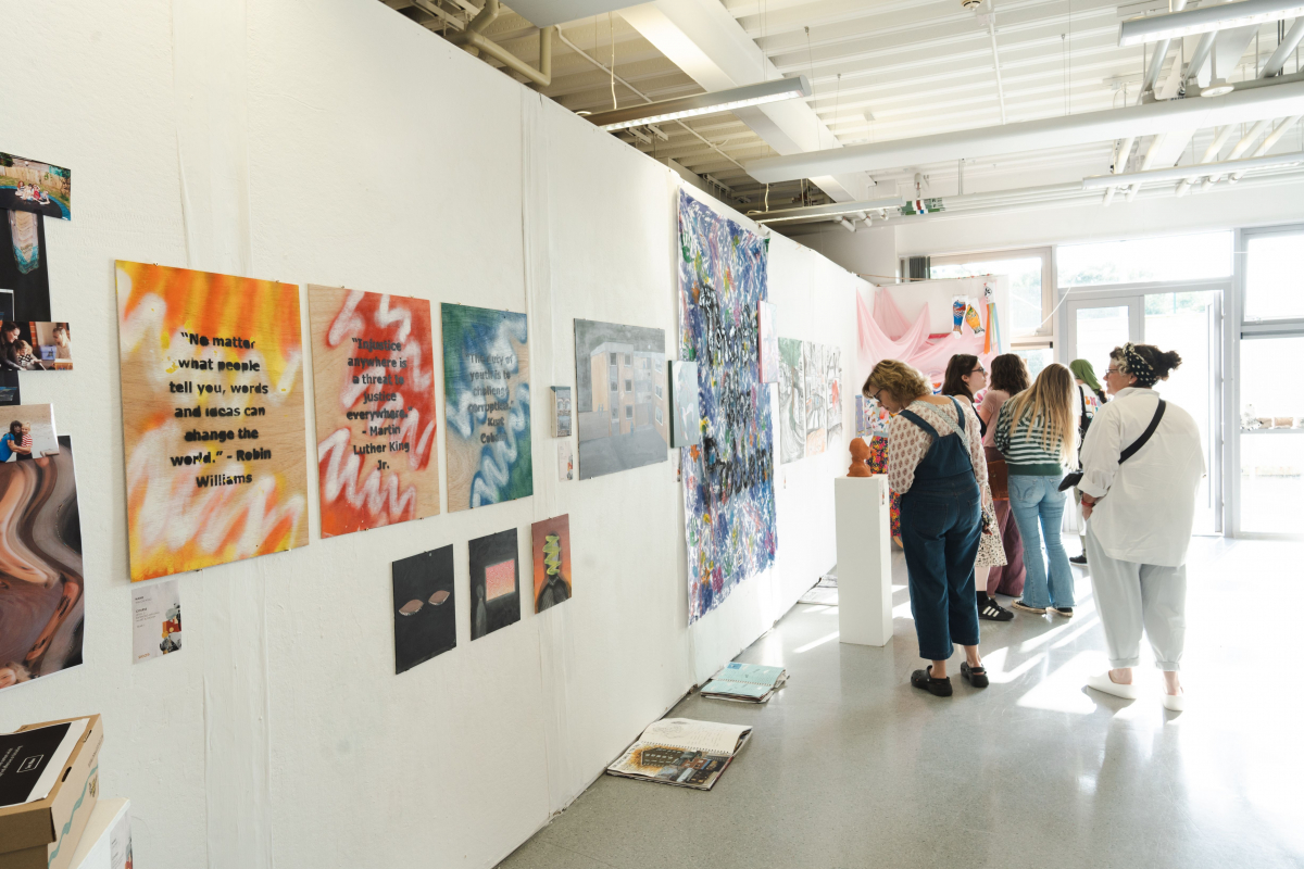 Artwork, paintings and print work along the wall 