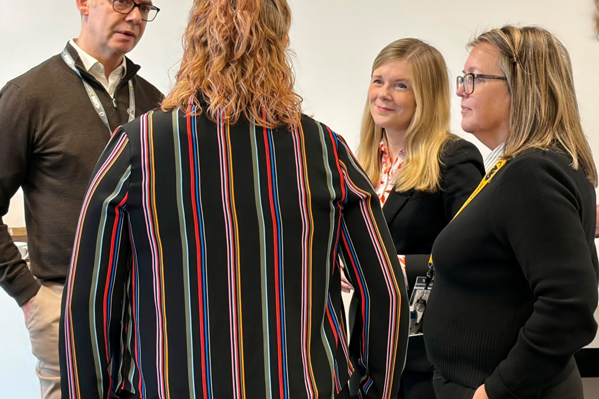 Staff talking to MP