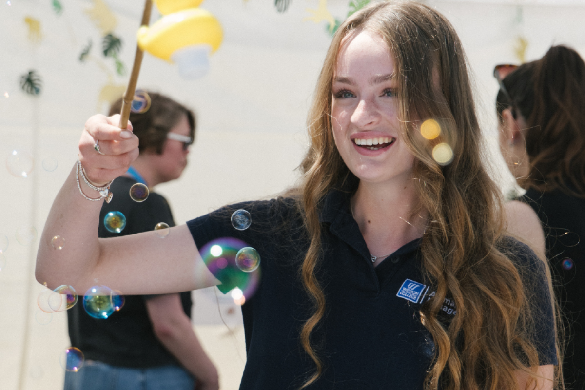 student playing 'hook-a-duck' 