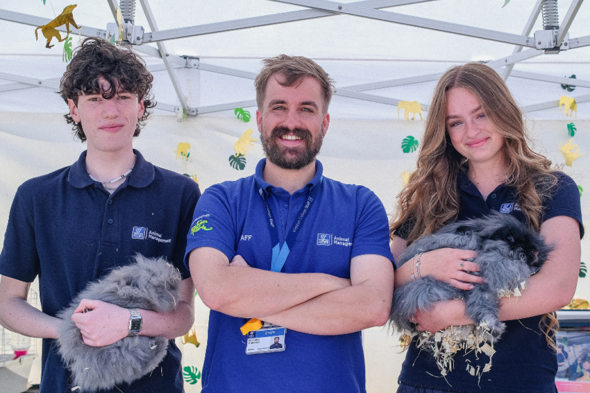animal management learners with rabbits