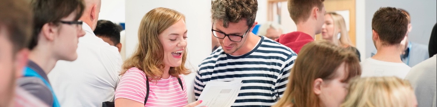students smiling about results