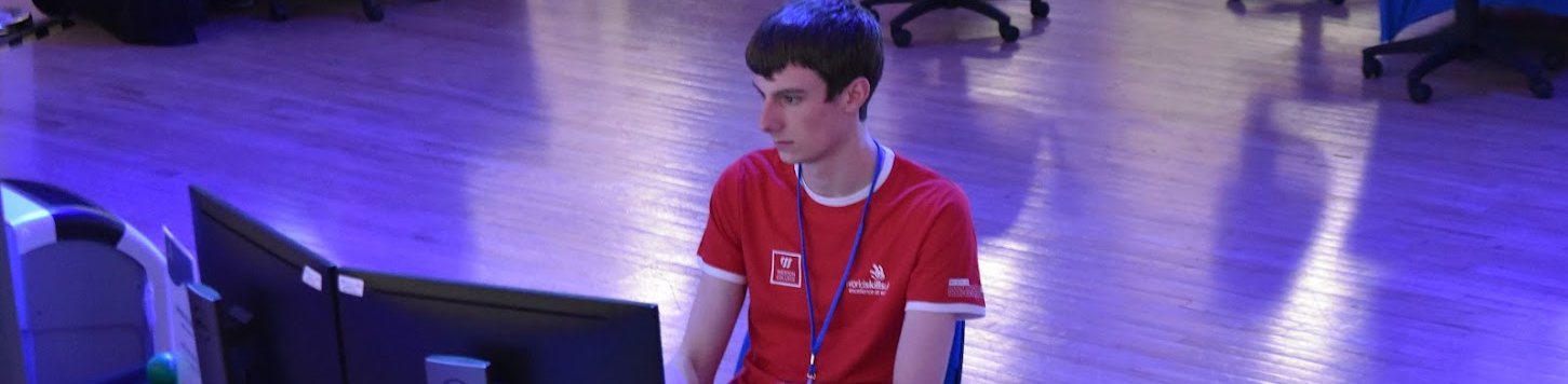 worldskills winner Jack using computer to design a website at WorldSkills web design finals in weston-super-mare