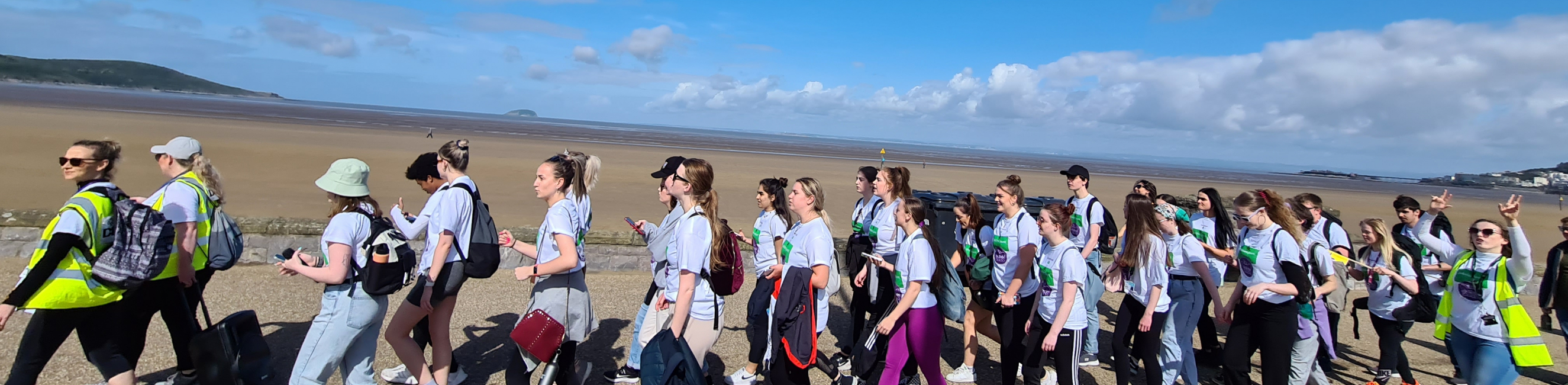 weston college students walking along the seafront in weston-super-mare