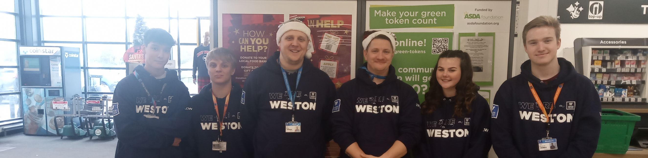 Learners smiling whilst supporting community at Asda