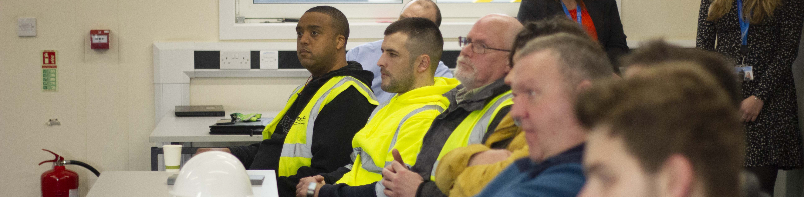 Learners listening to employer presentation