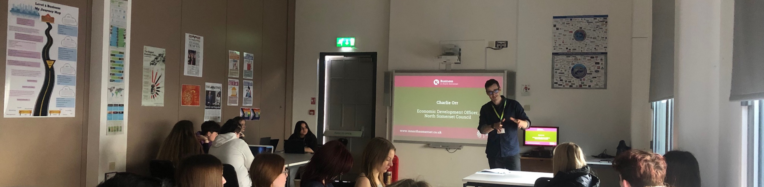Charlie stood at front of classroom delivering a guest talk