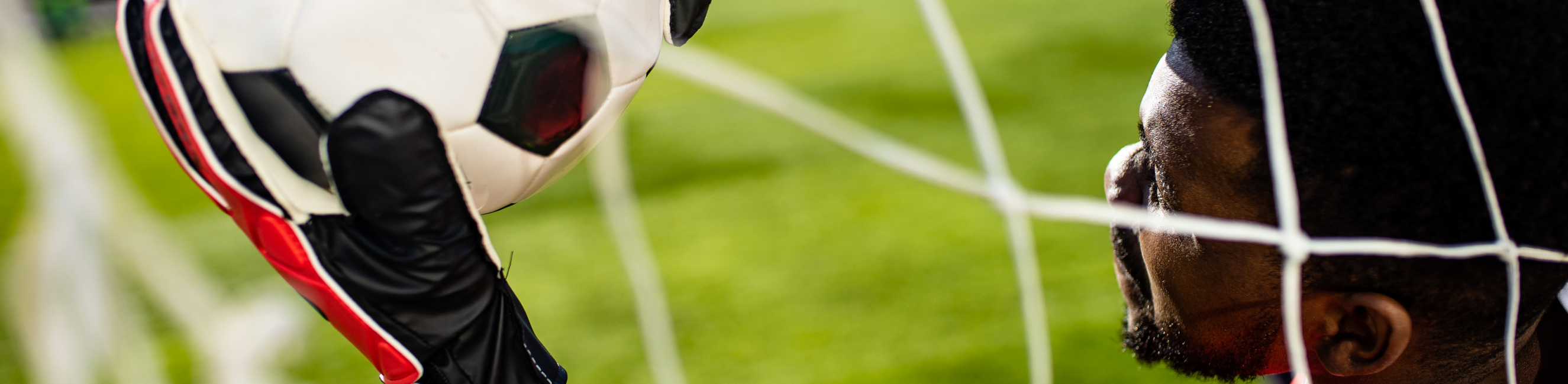 football goalkeeper saving a goal