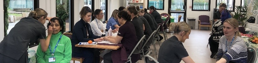 Learners pampering NHS staff in wellbeing centre