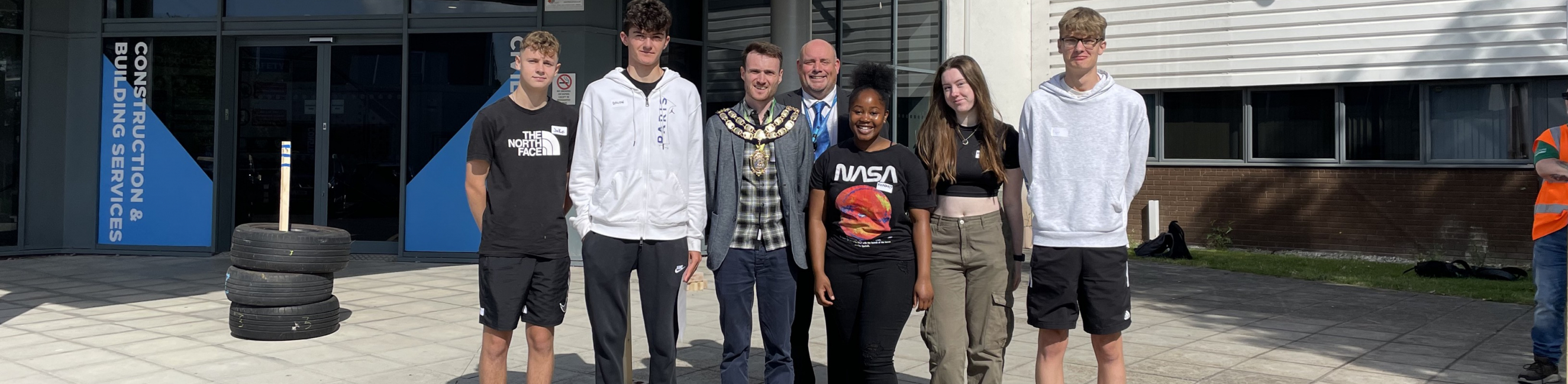Mayor and Head of Construction with learners on Welcome Day