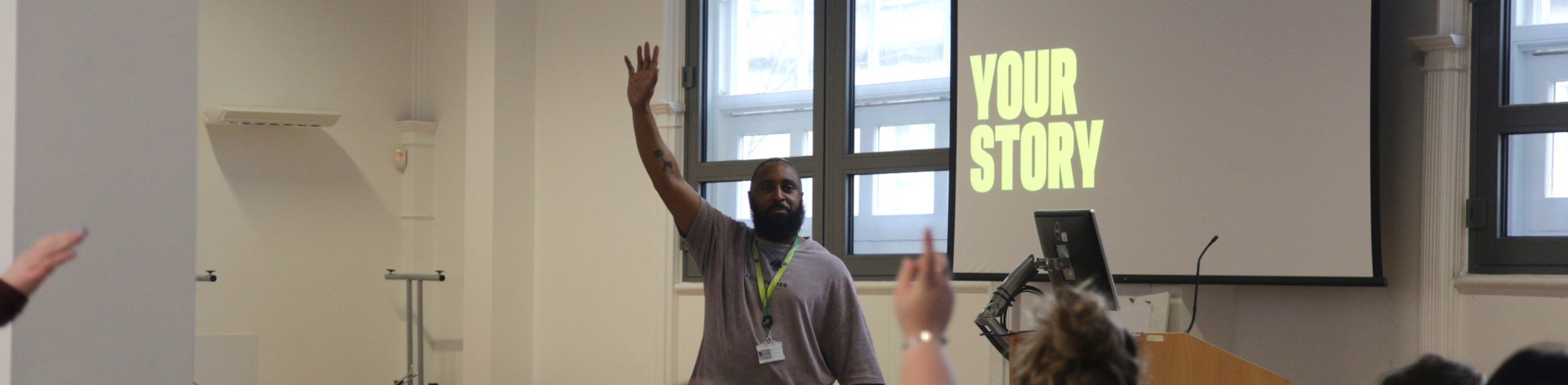 Richard from Loud Speaker raising his hand.