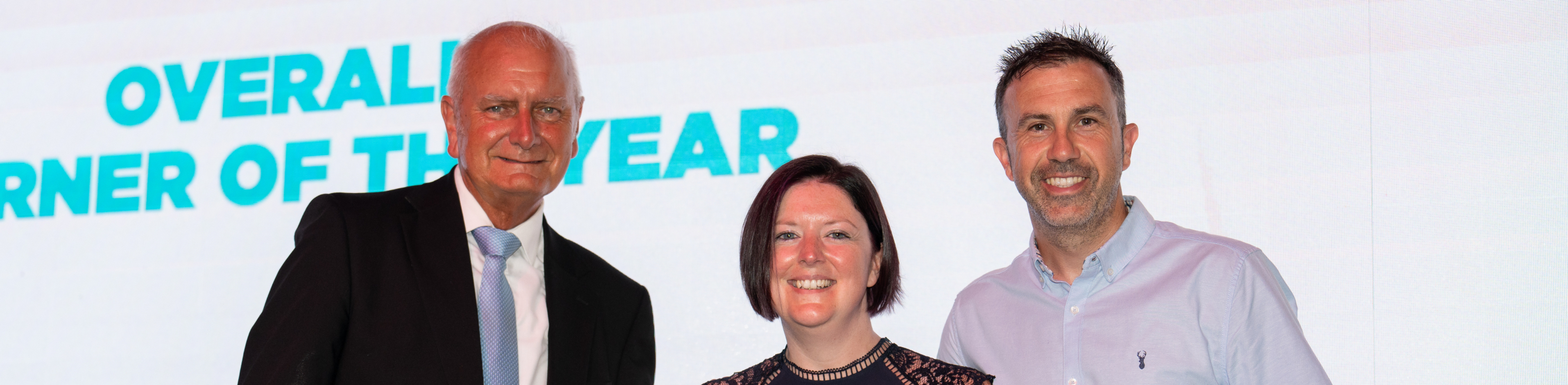 Jess being presented an award by Andrew Leighton Price