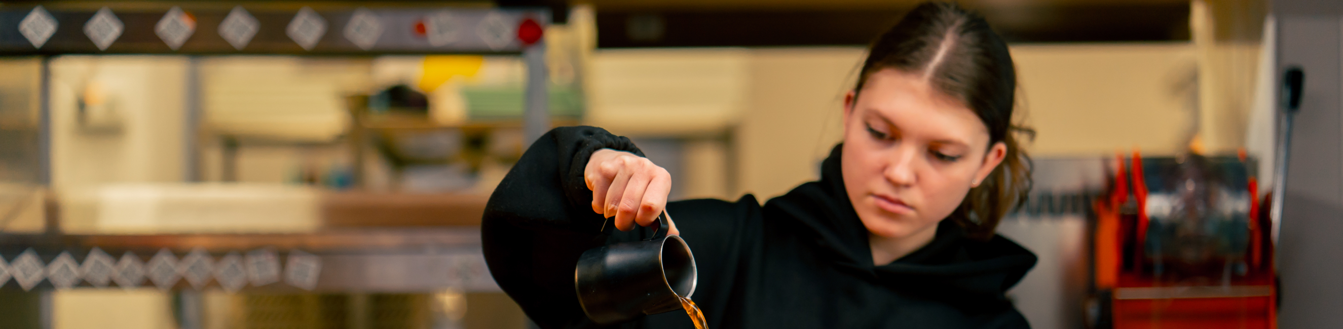 Young girl working in a cafe