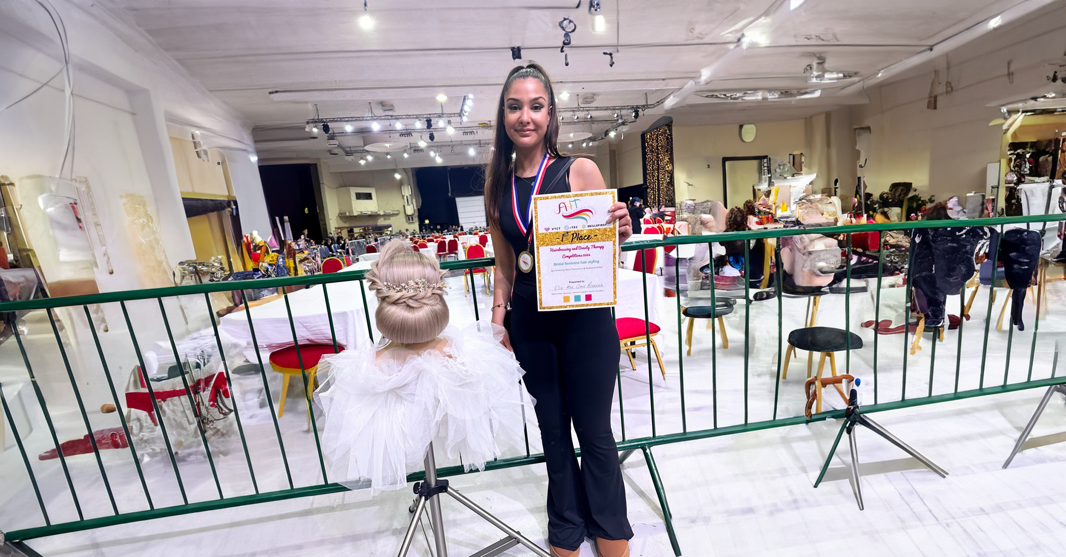 ellie brennan standing next to her winning piece