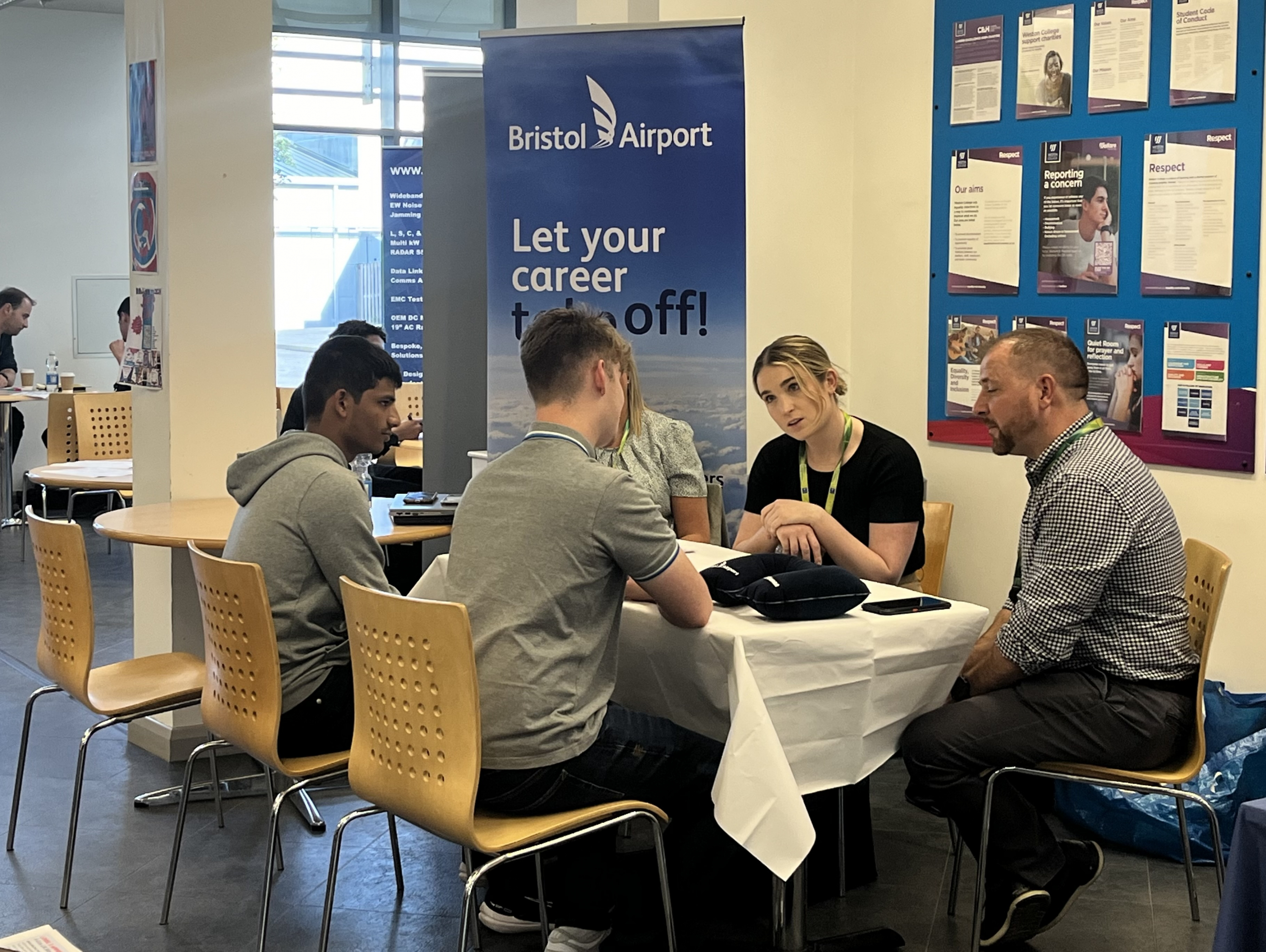 Bristol Airport recruiters in an informal interview with a learner