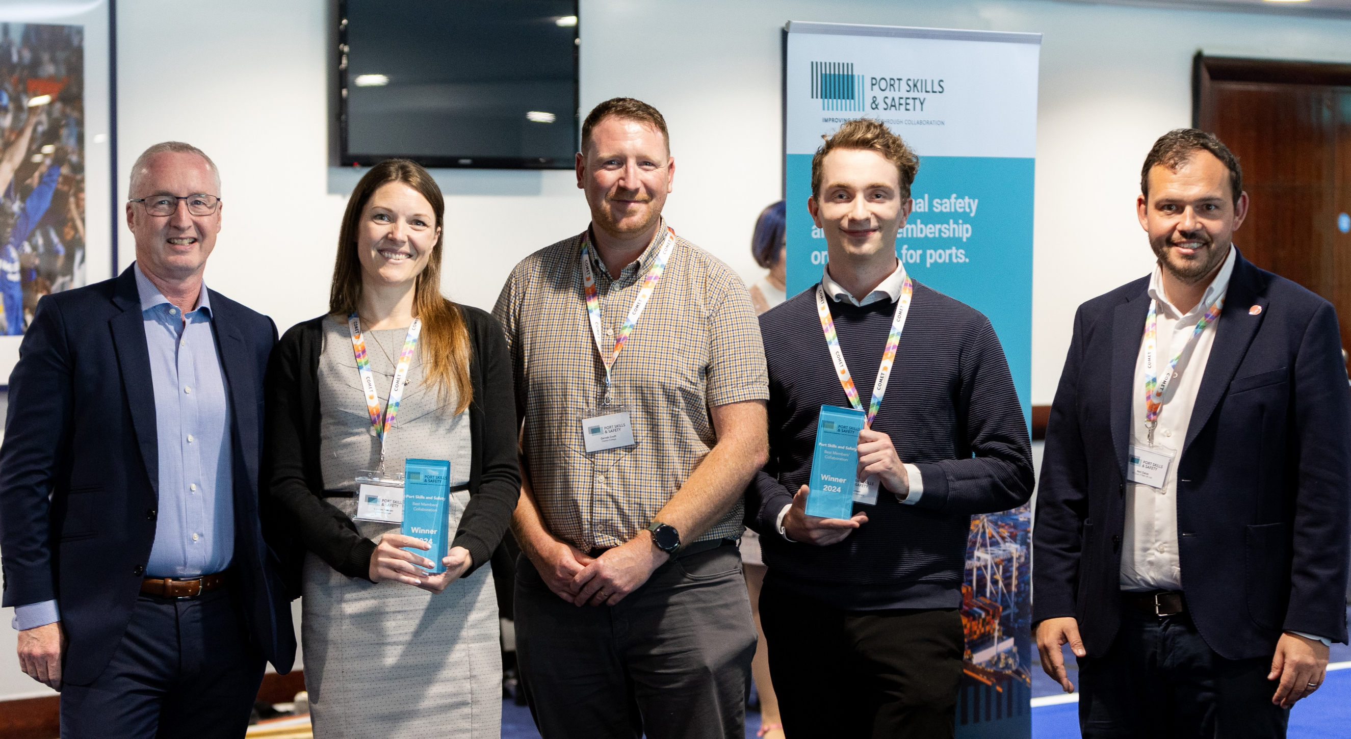 Members of Weston College and Bristol Port posing with the award at Stamford Bridge