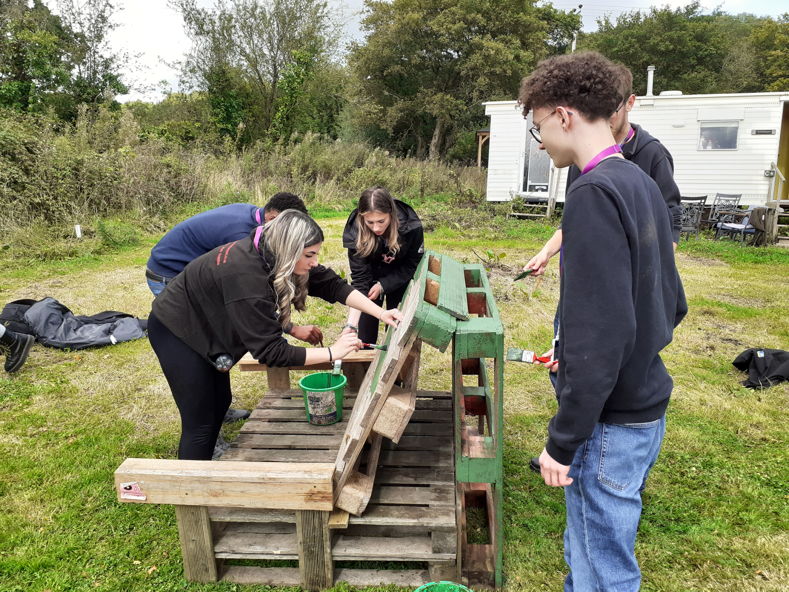 Construction T Level learners built a seat from pallets at Uncle Paul's Chilli Farm