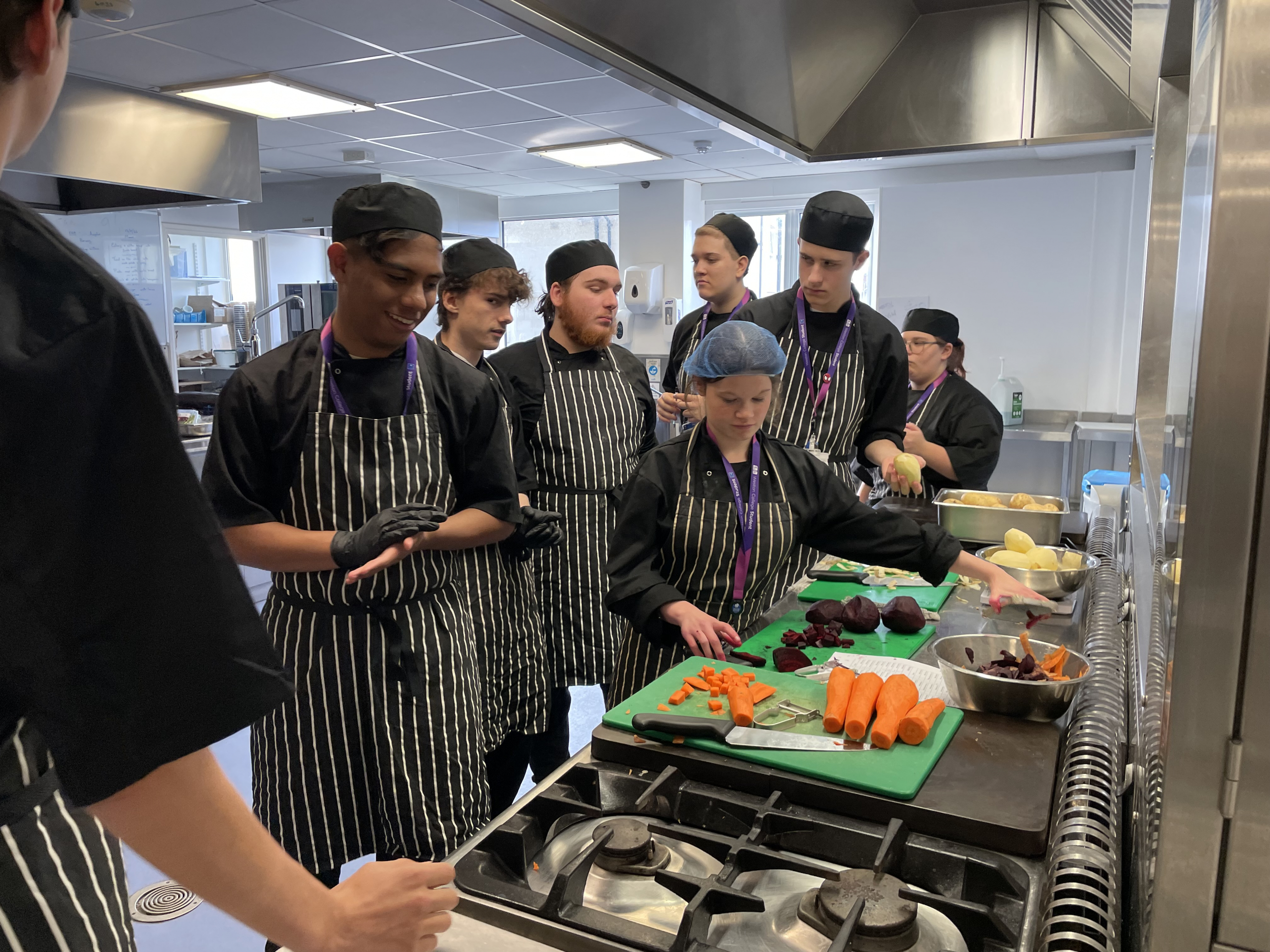 Hospitality and Catering learners prepping vegetables