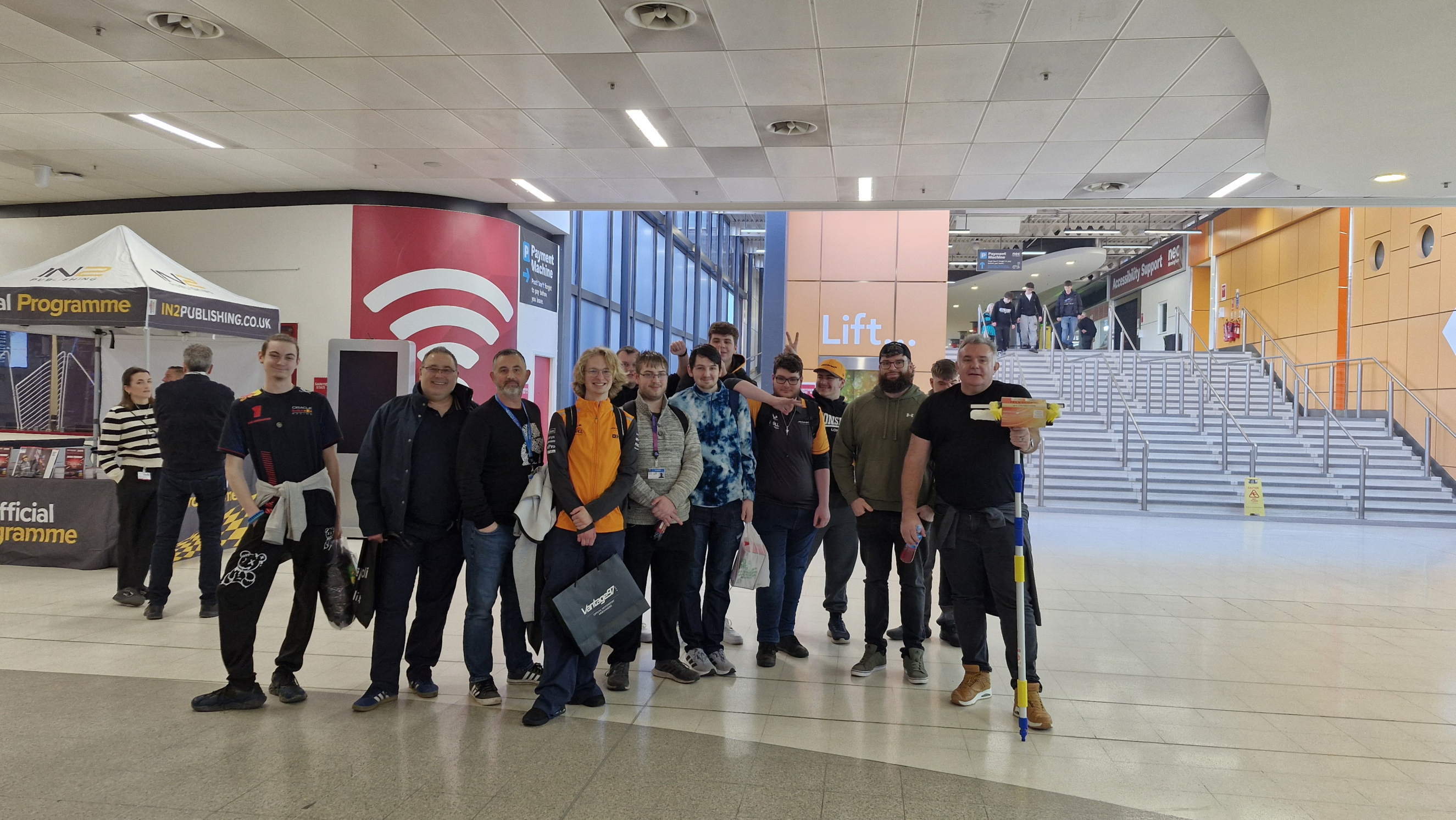 Learners posing in the foyer of the NEC