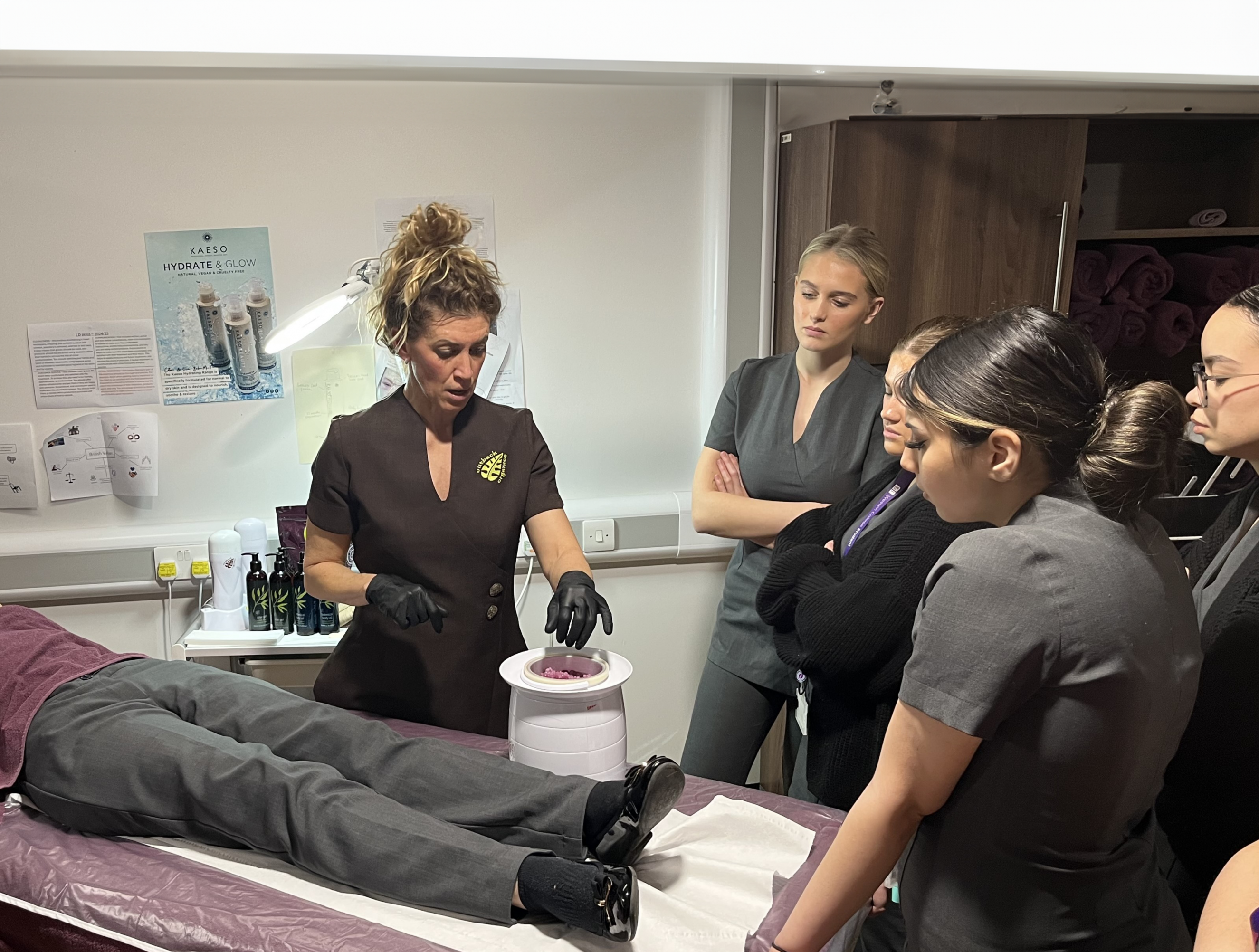 beauty therapy students learning from industry expert claire from outback organics