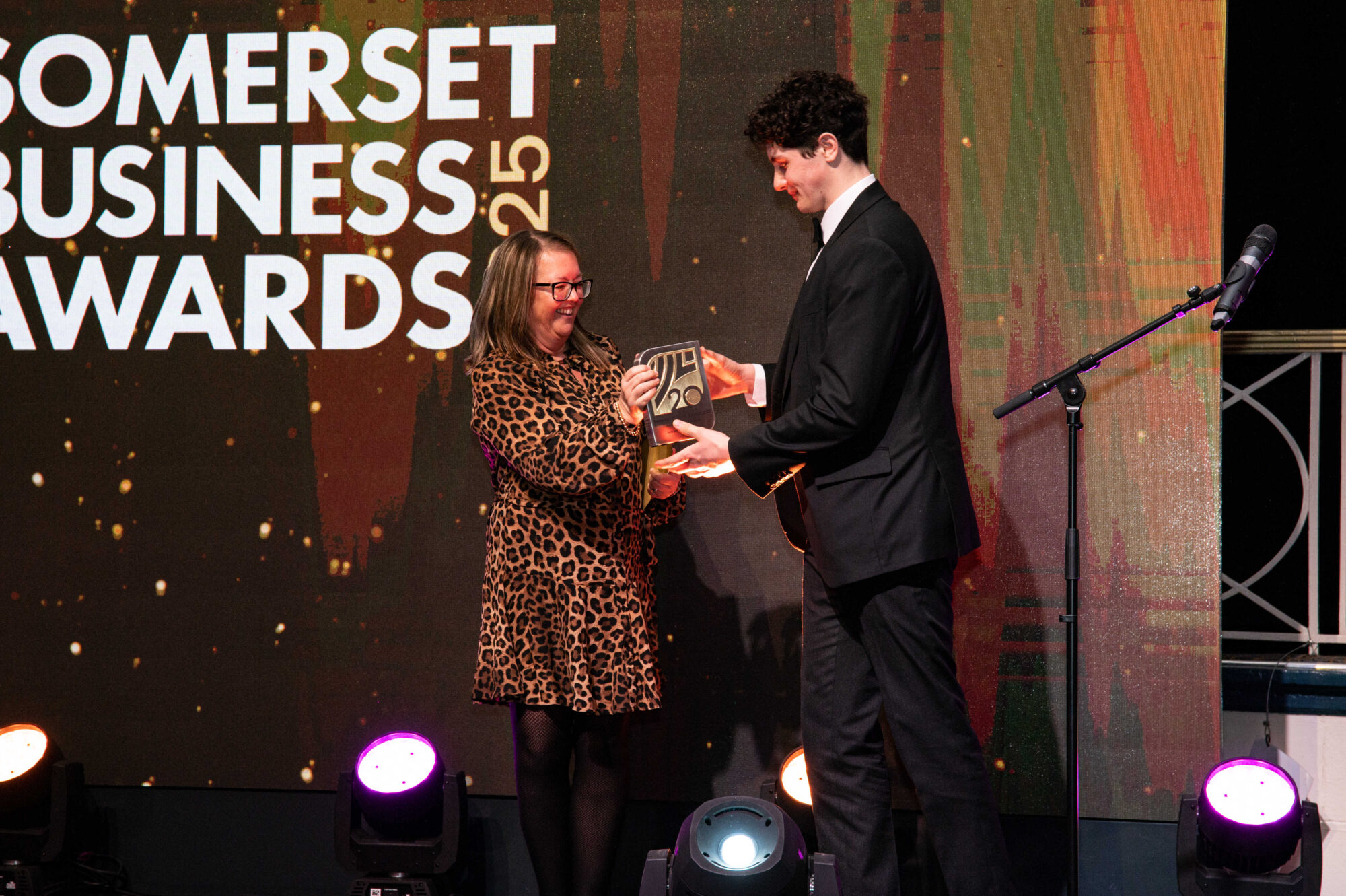 Jack receiving his award on stage