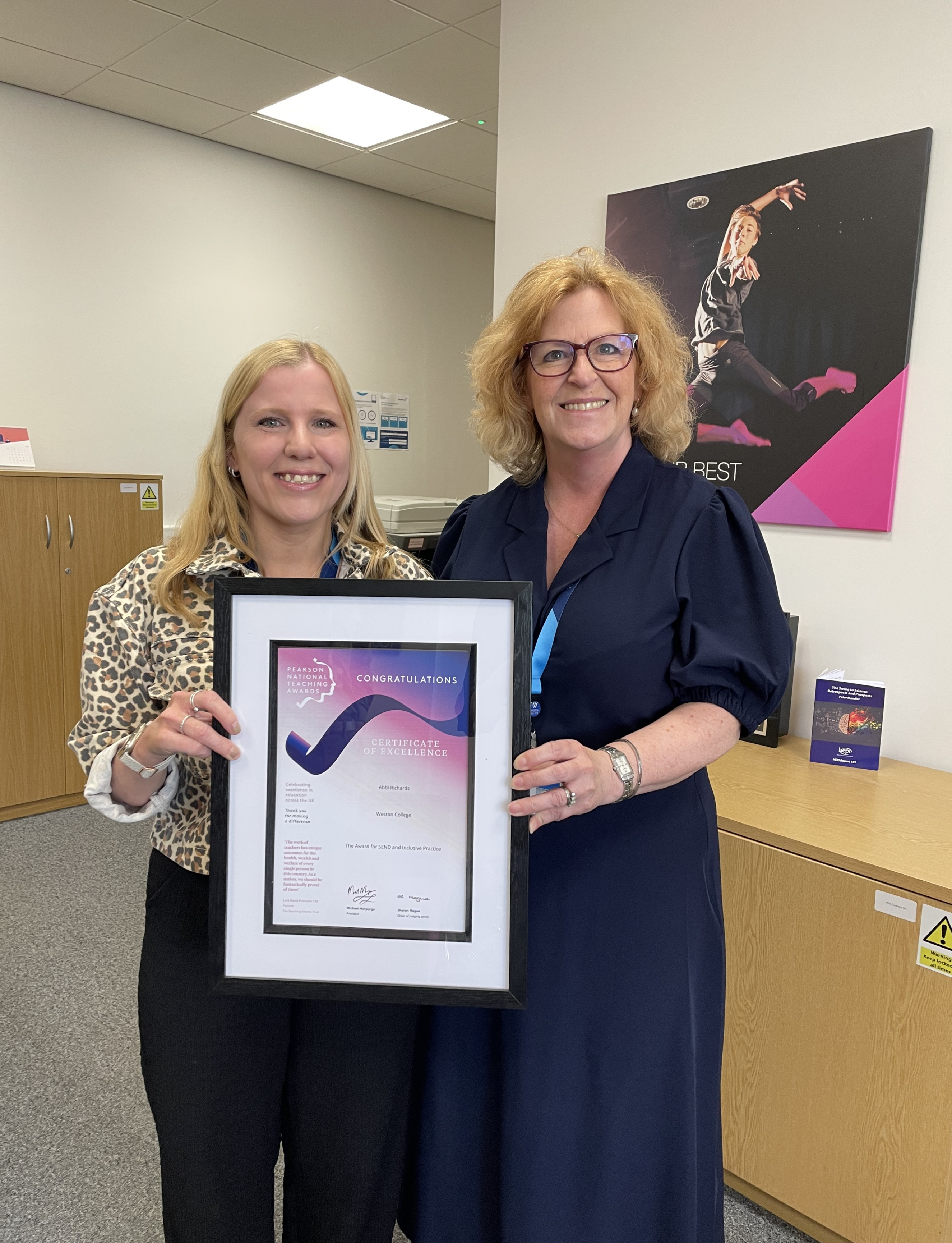 Abbi receiving her award from Pat