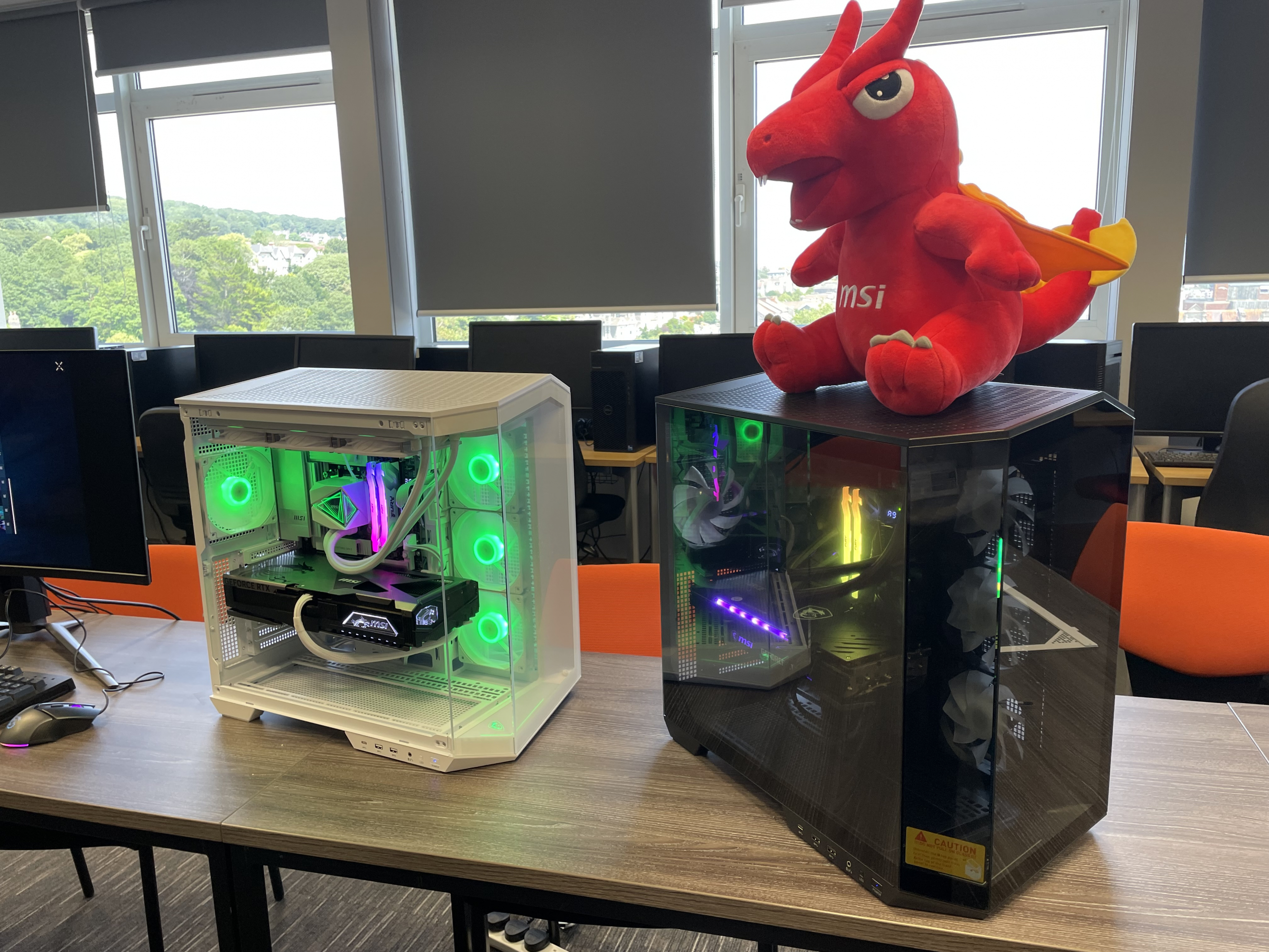 MSI mascot on top of high spec PCs