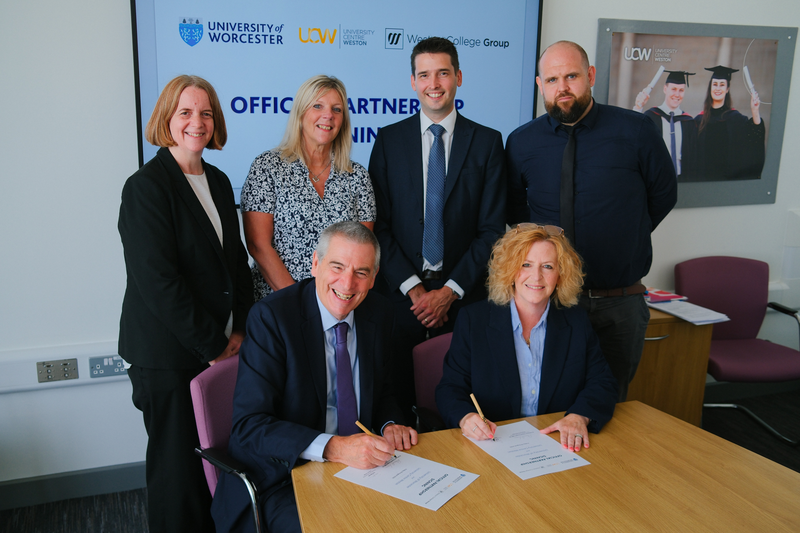 Senior leaders signing the agreement