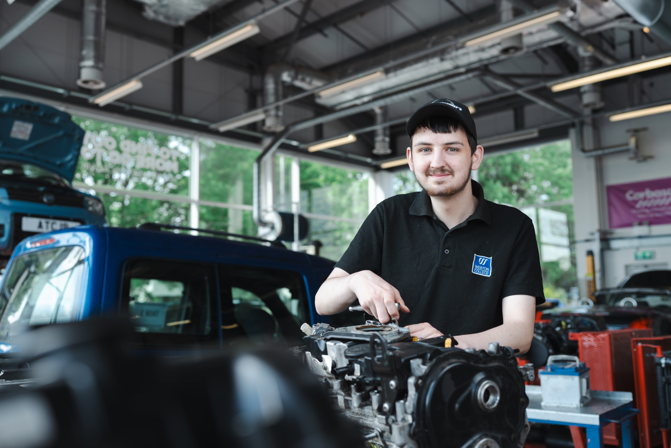 Automotive Learner Stood by Car