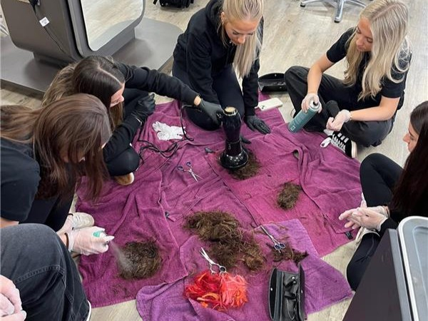 Students hair matting on the floor