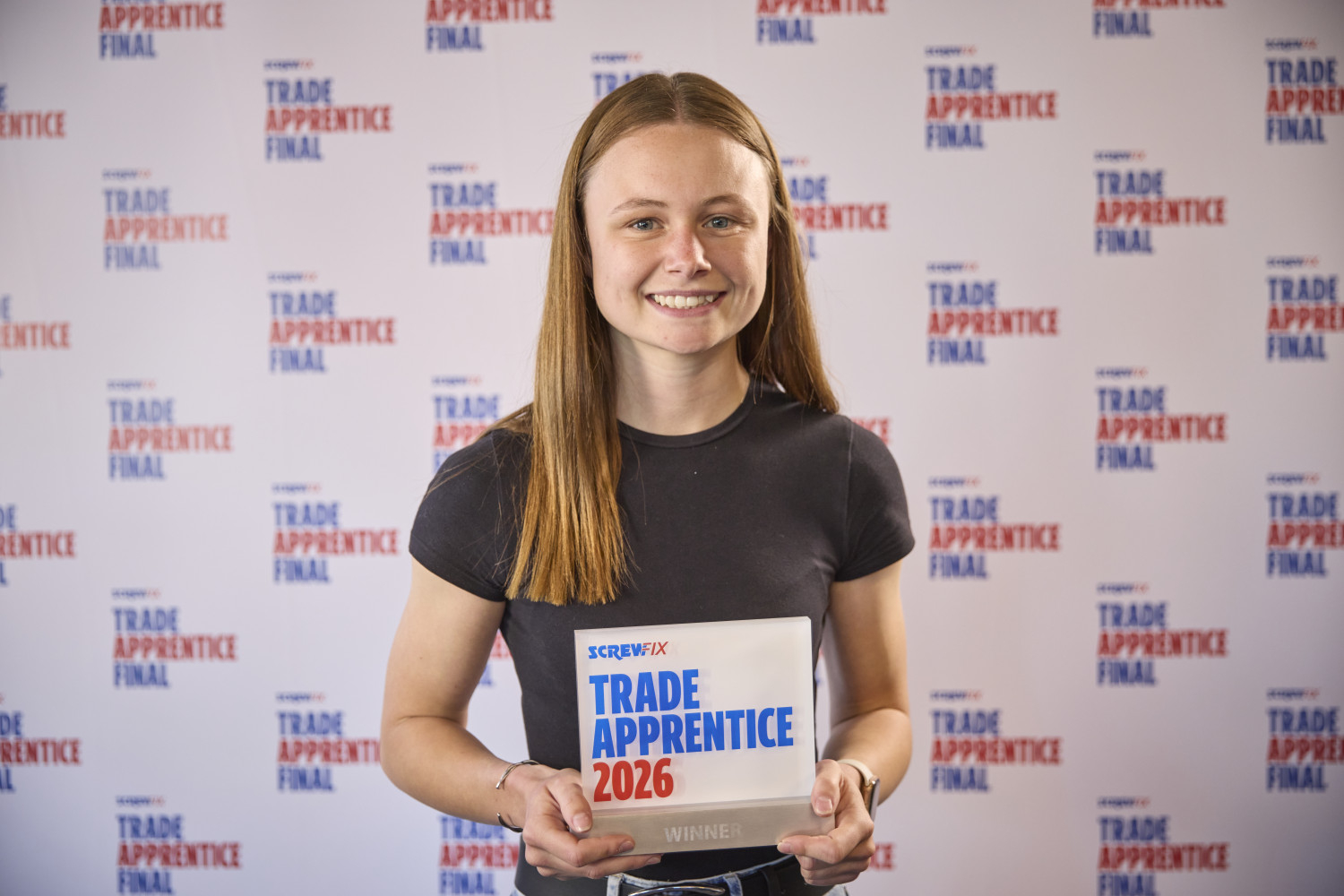 Gracie Donaghy holding her award
