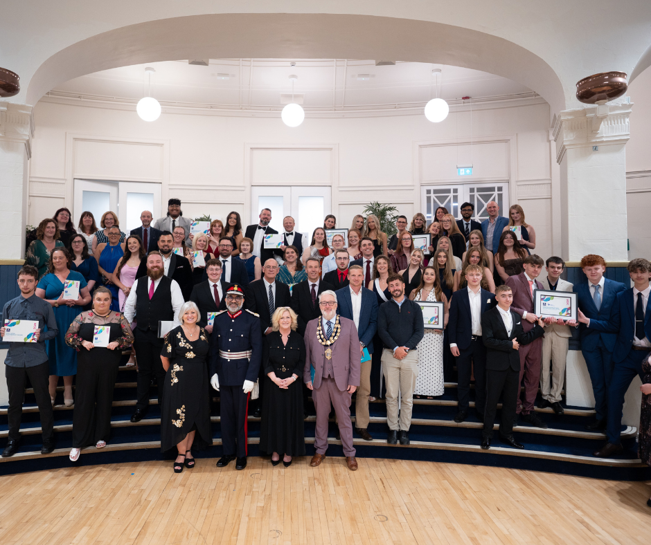 Business Award Winners on Stairs