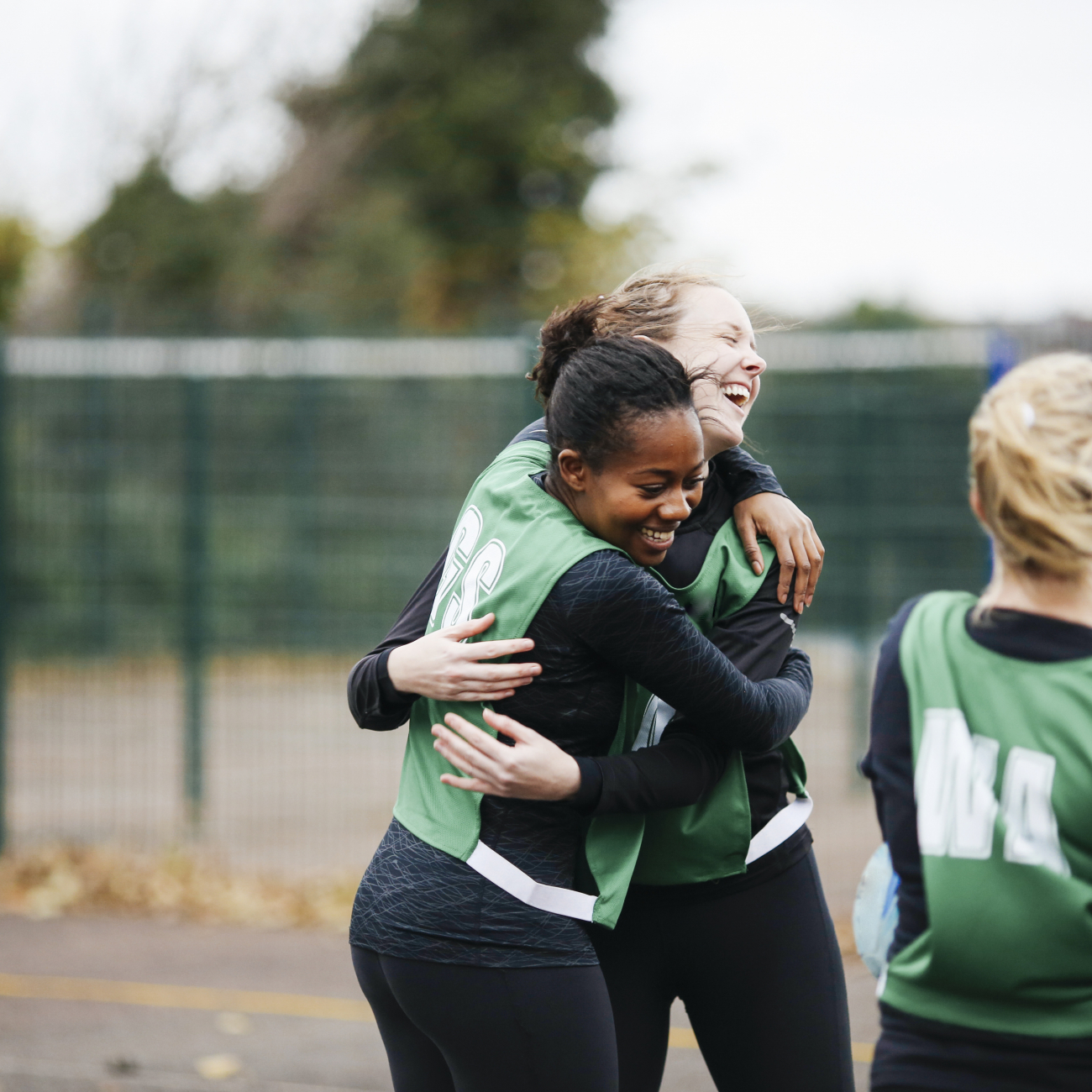 Female netball players celebrating