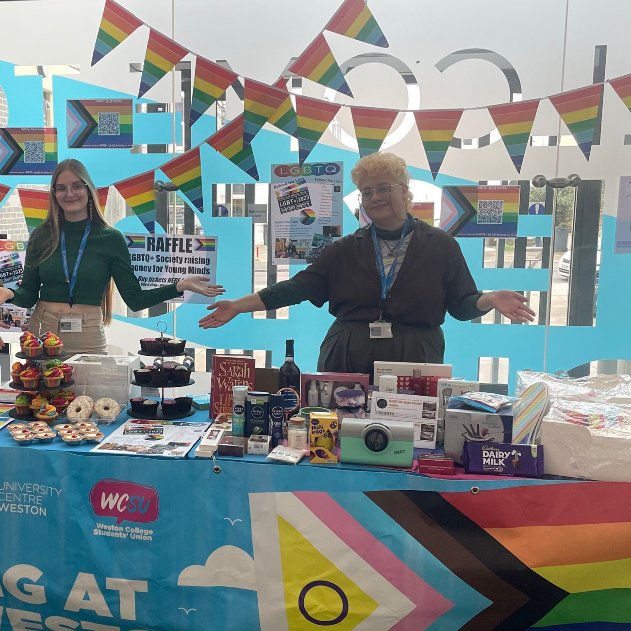 Staff at LGBTQ+ Stall in campus reception