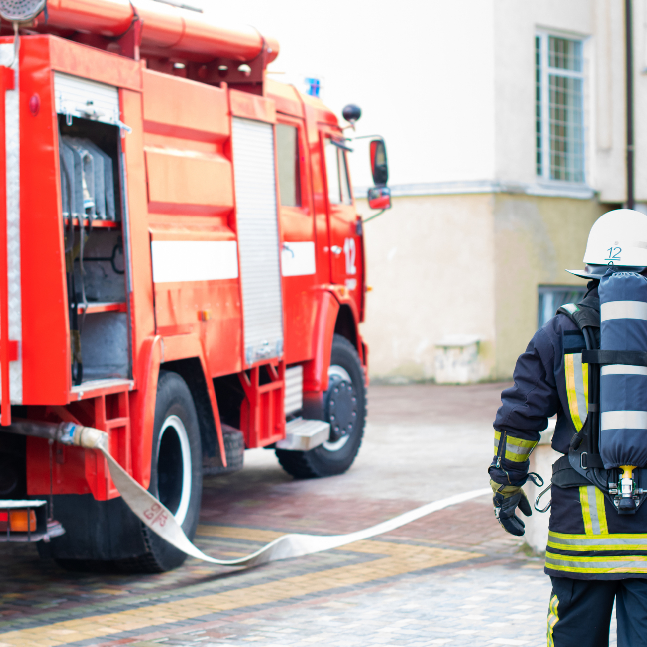 Firefighter with firetruck